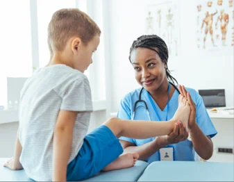 kid with healthcare professional during a mobile podiatry visit